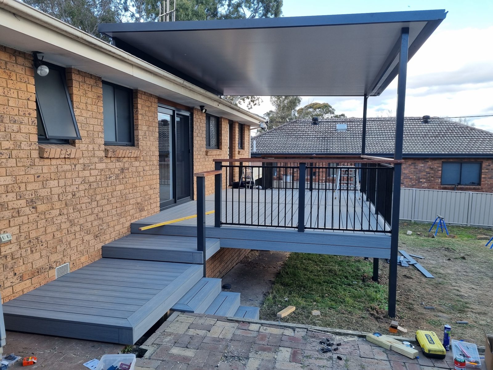 New composite deck with matching patio cover